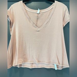 Free people intimates top in light mocha color. Size large.